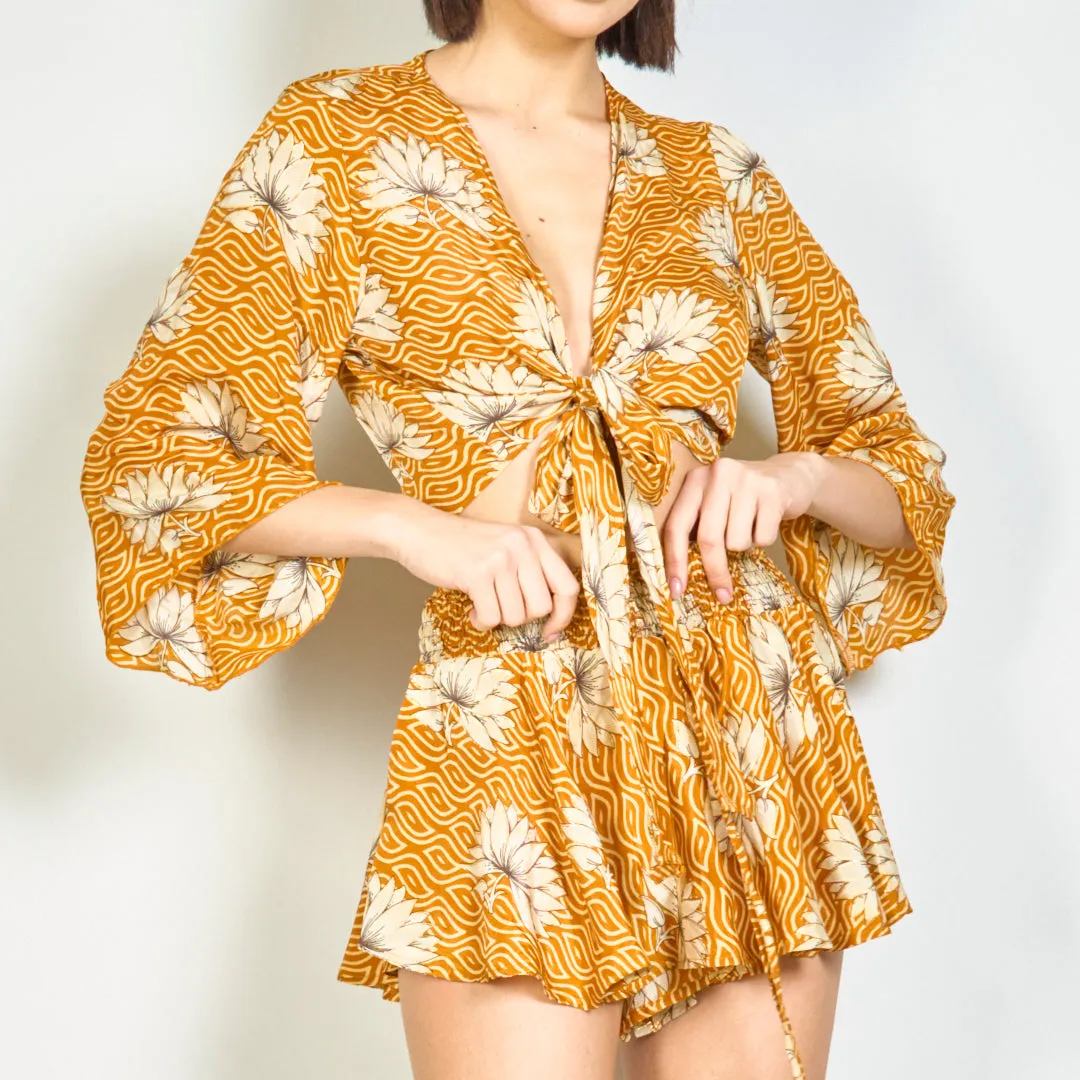 Floral tie-front blouse and smocked shorts set wholesale